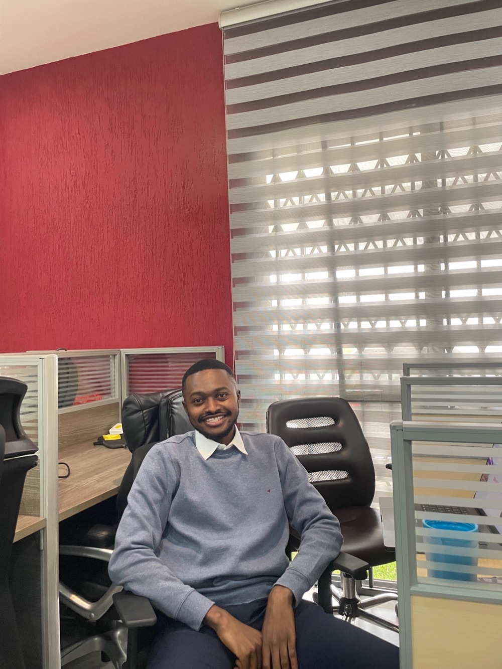 Gerald at work in an office.